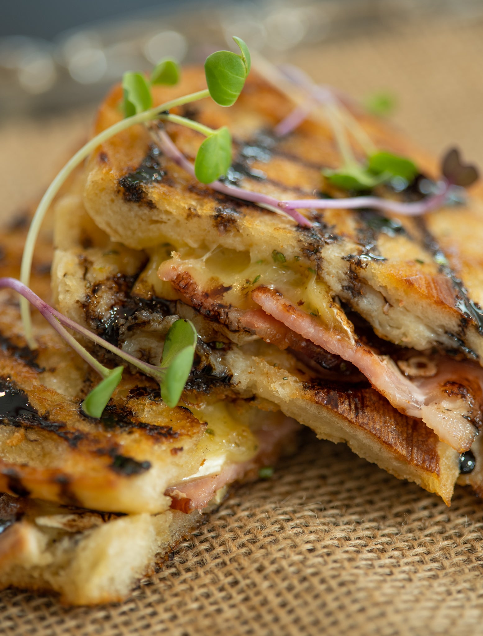 bacon, brie & apricot toasted sandwich with balsamic reduction