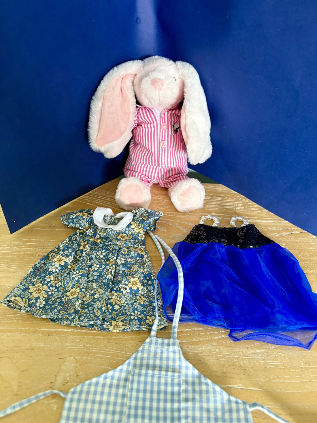 Marmalade Rabbit with clothing in a bag
