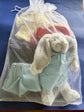Montgomery Rabbit with clothing in a bag